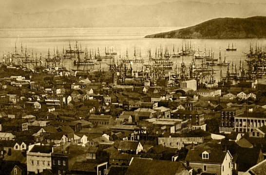 Photo: the harbor of San Francisco, California, in 1851, with Yerba Buena Island and the Berkeley Hills in the background. Credit: Library of Congress, Prints and Photographs Division.