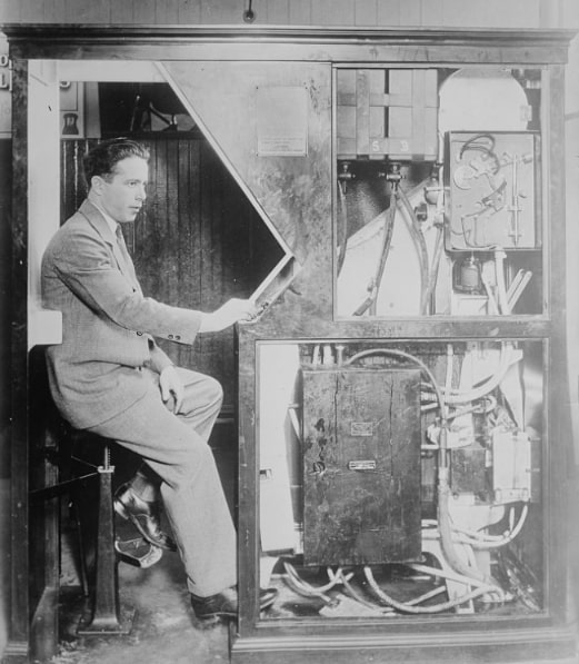 Photo: inventor Anatol Josepho inside his photo booth, c. 1927. Credit: Library of Congress, Prints and Photographs Division.