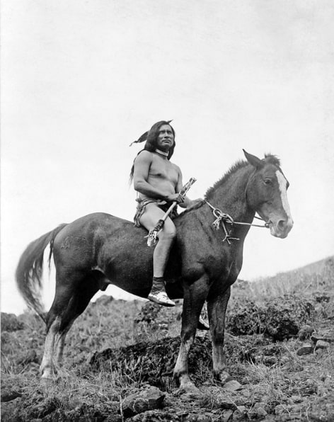 Photo: the old-time warrior: Nez Percé man, wearing loin cloth and moccasins, on horseback. From the Edward S. Curtis Collection, Library of Congress, Prints and Photographs Division.