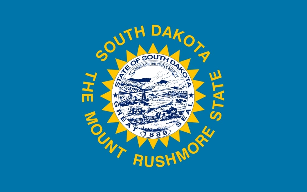 Illustration: South Dakota state flag. Credit: Wikimedia Commons.