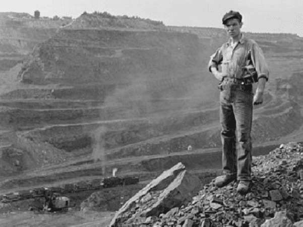 Photo: one end of the Hull-Rust-Mahoning Open Pit Iron Mine, largest open pit iron mine in the world, near Hibbing, Minnesota, August 1941. Credit: John Vachon; Library of Congress, Prints and Photographs Division.
