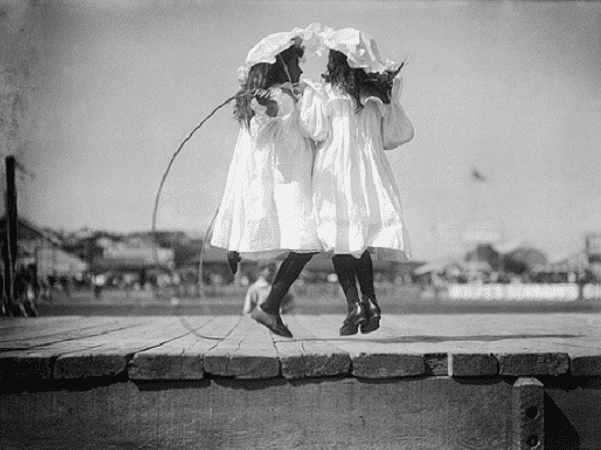 Photo: girls skipping at a carnival, c. 1900. Credit: Powerhouse Museum; Flickr The Commons.