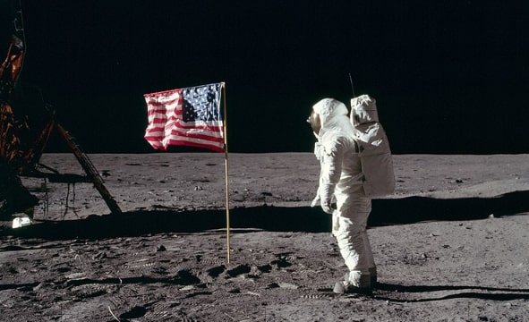 Photo: astronaut “Buzz” Aldrin salutes the United States flag on the lunar surface, 20 July 1969; photo taken by fellow astronaut and moon-walker Neil A. Armstrong. Credit: NASA; Wikimedia Commons.