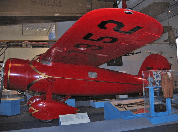 Photo: this red Lockheed Vega 5b airplane, flown by Amelia Earhart, is on display at the National Air and Space Museum in Washington, D.C. Credit: Sergio Caltagirone; Wikimedia Commons.