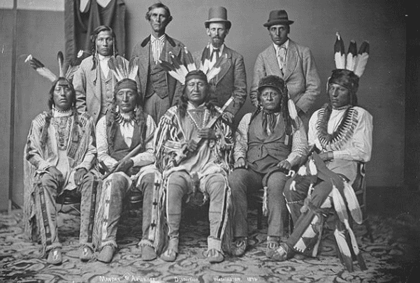 Photo: Mandan and Arikara delegation, c. 1876. Credit: U.S. National Archives and Records Administration; Wikimedia Commons.