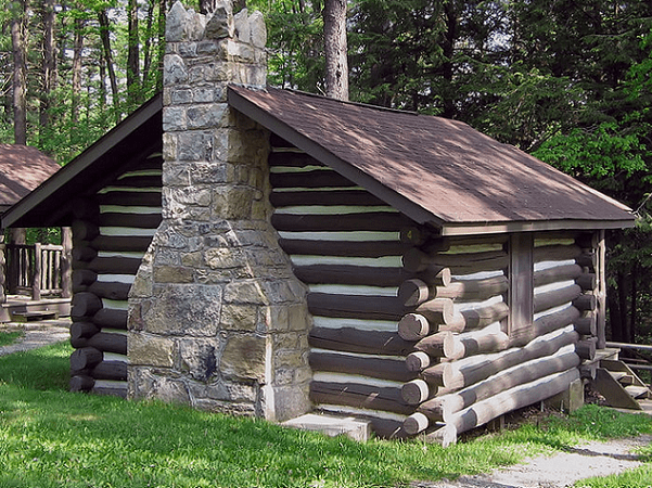 Photo: a log cabin built by the Civilian Conservation Corps between 1933 and 1937 in Black Moshannon State Park, Pennsylvania. Credit: Ruhrfisch; Wikimedia Commons.