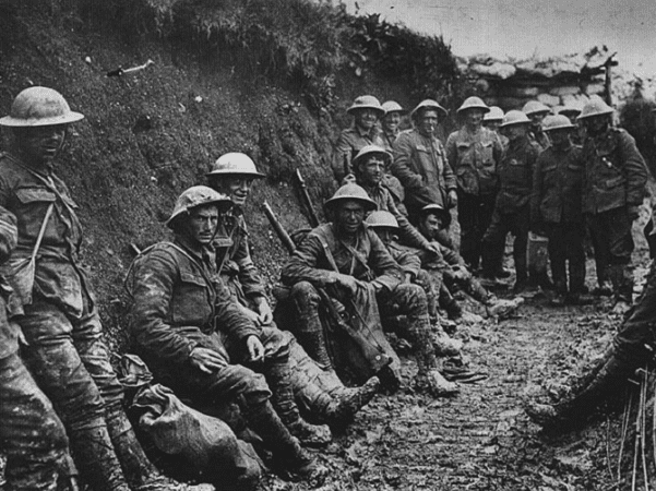 Photo: a ration party of the Royal Irish Rifles in a communication trench during the Battle of the Somme. The date is believed to be 1 July 1916, the first day on the Somme. Credit: Royal Engineers No 1 Printing Company; Wikimedia Commons.
