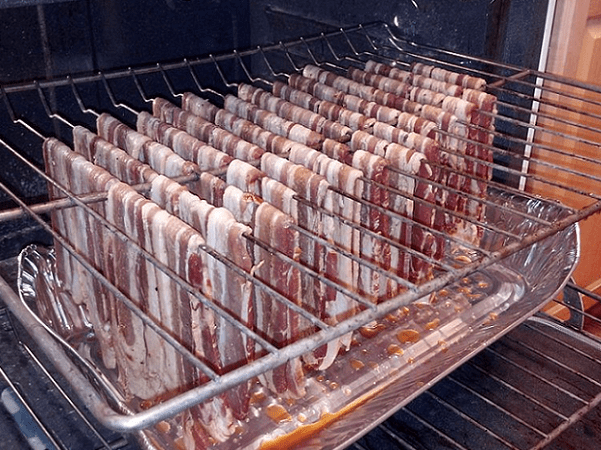 Photo: maple brown sugar five spice bacon jerky about to be oven-cured. Credit: Evan Cooper; Wikimedia Commons.