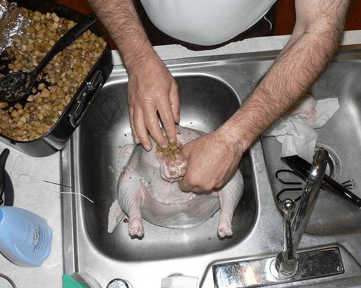 Photo: stuffing a turkey