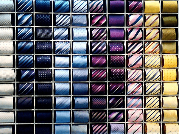 Photo: a collection of different colors of ties. Credit: Ana Cotta; Wikimedia Commons.