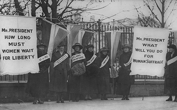 Photo: "Silent Sentinels" begin a ​2 1⁄2-year campaign in front of the White House for women's suffrage, 1917. Credit: Library of Congress, Prints and Photographs Division.
