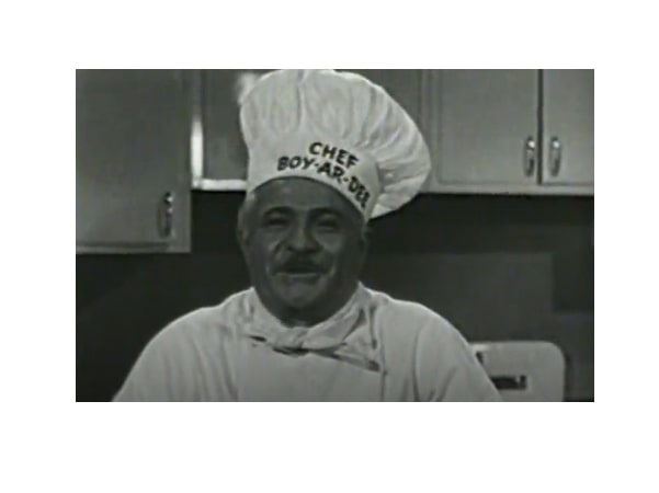 Photo: “Chef Boyardee” (Ettore Boiardi); a screenshot from a 1953 commercial for Chef Boyardee Spaghetti Dinner. Credit: Internet Archive.