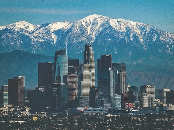 Photo: Los Angeles skyline and San Gabriel Mountains, California. Credit: salewskia; Wikimedia Commons.