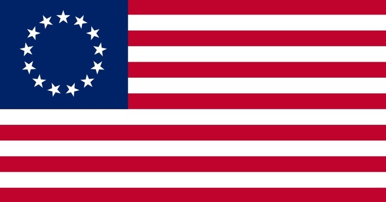 Illustration: version of the “Betsy Ross’ design of the first flag of the United States (i.e., with 13 stars in a circle)