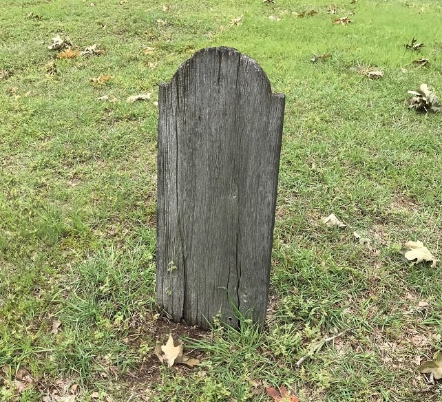 Photo: wooden grave marker in Denton, Texas, with inscription worn away