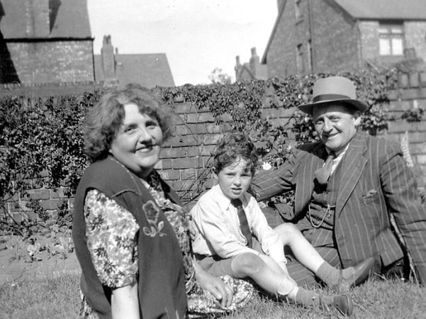 Photo: “Philip with His Grandparents,” 1953. Credit: Phillip Capper; Wikimedia Commons.
