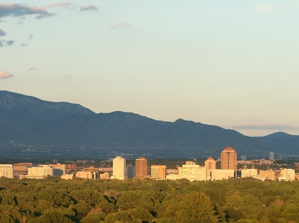 Photo: Albuquerque and Sandia Mountains at sunset, New Mexico. Credit: Daniel Schwen; Wikimedia Commons.
