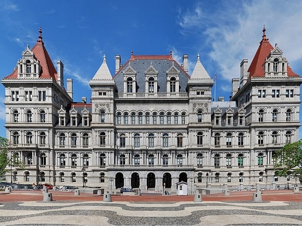 Photo: the New York State Capitol in Albany, New York. Credit: Matt H. Wade; Wikimedia Commons.