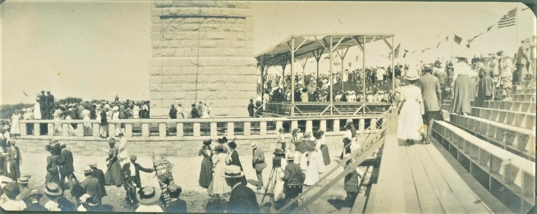 Photo: a crowd gathers for the dedication ceremony for the Pilgrim Monument, Provincetown, Massachusetts, on 5 August 1910. Credit: the Scrapbook Collection of John Dowd-Althea Boxell; Digital Commonwealth, Provincetown History Preservation Project.