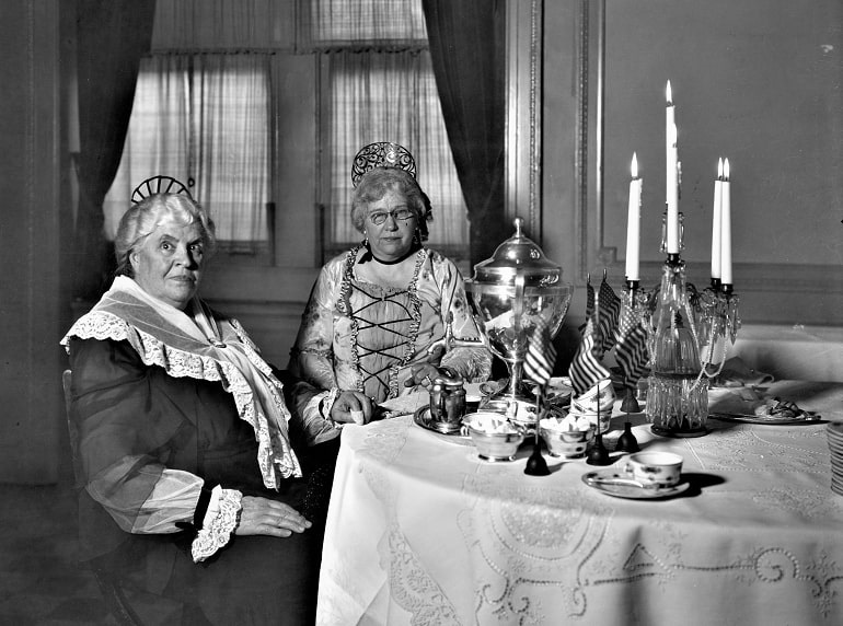 Photo: Mrs. Effie Reed Weeth and Mrs. Raymond V. Cole dressed in colonial costume, Daughters of the American Revolution Omaha Chapter tea, February 1932, from the Nathaniel L. Dewell Collection #51724. Courtesy of the Nebraska Historical Society.