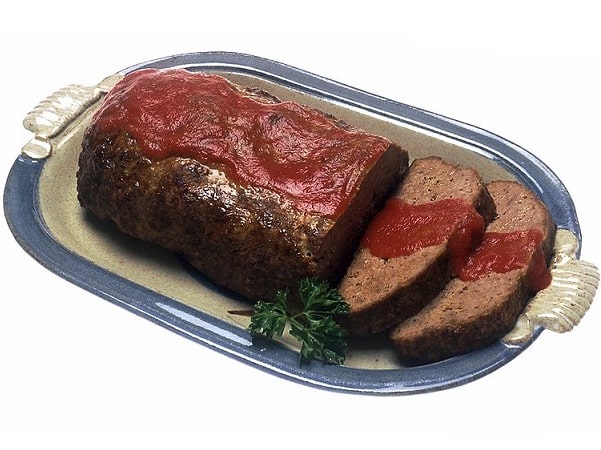 Photo: meatloaf garnished with a sauce on top. Credit: Renee Comet; National Institutes of Health.