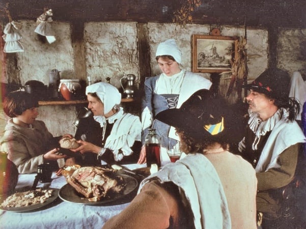 Photo: Pilgrim meal at Plimoth Plantation. Courtesy of University Archives and Special Collections, University of Massachusetts Boston Digital Commonwealth. Permission to publish.