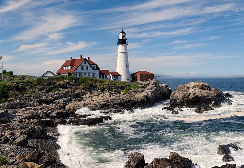 Photo: the Maine coast and Portland Head Light in Cape Elizabeth, Maine. Credit: Rapidfire; Wikimedia Commons.