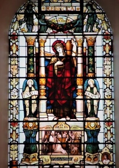 Photo: image from stained-glass window in Pocahontas’ memory known as the “Rebecca” window, St. George’s Church, in Gravesend, England. Courtesy of the First California Company, Jamestowne Society, https://jamestownecalifornia.org/