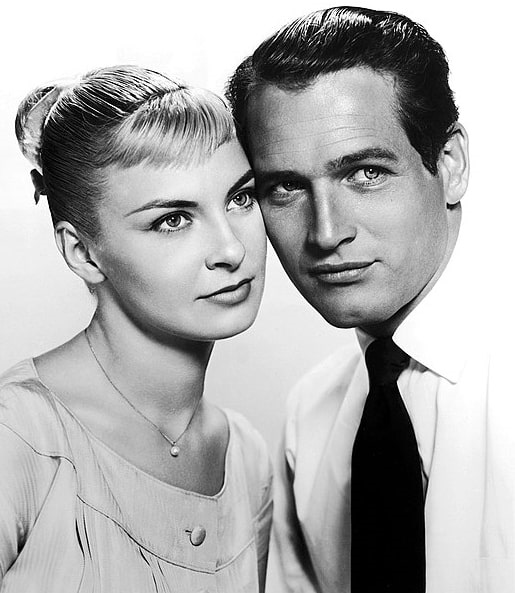 Photo: Paul Newman with second wife, actress Joanne Woodward, in a publicity photograph for the 1958 film “The Long, Hot Summer.” Credit: 20th Century Fox; Wikimedia Commons.