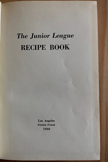 Photo: title page from the first “The Junior League Recipe Book,” from 1930. Credit: Gena Philibert-Ortega.