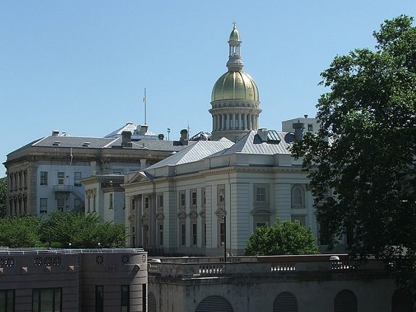 Photo: the New Jersey State House in Trenton, New Jersey. Credit: Marion Touvel; Wikimedia Commons.