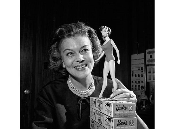 Photo: Barbie's first clothing designer, Charlotte Johnson, posing with 1965 Barbie doll model, 13 May 1964. Credit: Nelson Tiffany, Los Angeles Times; Wikimedia Commons.