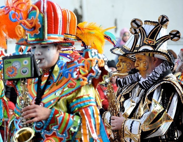 Photo: a band performs in the 2010 Mummers Parade in Philadelphia, Pennsylvania, 1 January 2010. Credit: Kevin Burkett; Wikimedia Commons.