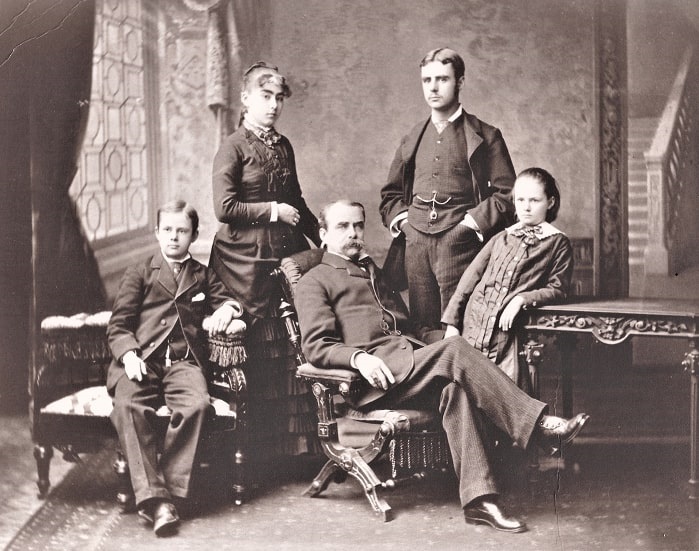 Photo: William Latane Montague Sr. (middle, seated in chair) with his children by his marriage to Sallie Howard Love: in back to the left is Bessie Love Montague (married David Buchan Merryman); in back to the right is William Latane Montague Jr. (married Janet Gordin MacMurdo); seated in chair to the left is Frank Howard Montague; and on the right is Alice Mary Montague, who became the mother of Wallis, Duchess of Windsor, through her first marriage to Teackle Wallis Warfield – who died when Wallis was 5 months old. Courtesy of A. D. Mather of Baltimore, Maryland, a descendant.