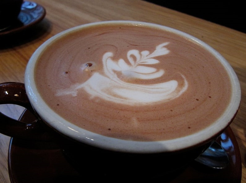 Photo: latte art on hot chocolate. Credit: Jo Anslow; Wikimedia Commons.