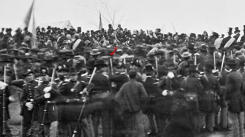 Photo: U.S. President Abraham Lincoln at Gettysburg, Pennsylvania, where he delivered the Gettysburg Address, on November 19, 1863. A crowd of citizens and soldiers surround Lincoln (with a red arrow pointing to his location in photo). Credit: Mathew Benjamin Brady; National Archives and Records Administration.