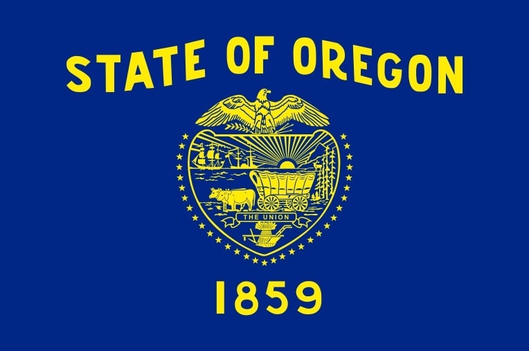 Illustration: Oregon state flag. Credit: Wikimedia Commons.