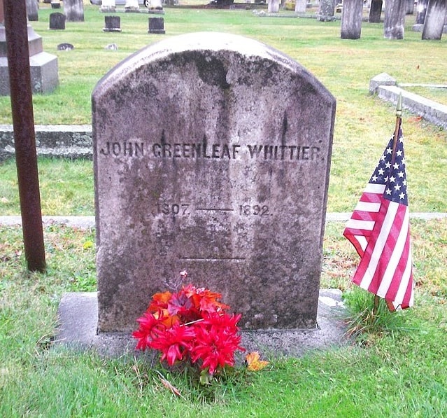 Photo: grave of American poet John Greenleaf Whittier in the Union Cemetery, Amesbury, Massachusetts. Credit: Midnightdreary; Wikimedia Commons.