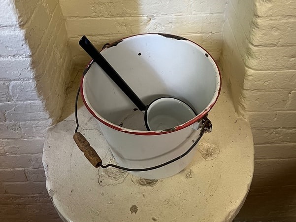 Photo: common cup and drinking bucket at the McCormick School Museum, Wichita, Kansas. Credit: Gena Philibert-Ortega.