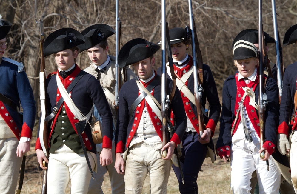 Photo: Revolutionary War reenactors marching.