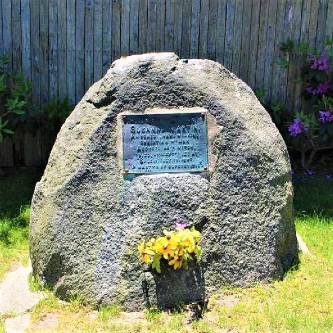 Photo: memorial to Susanna (North) Martin, one of fourteen women executed for the suspicion of practicing witchcraft during the Salem witch trials of colonial Massachusetts. North Martin Road, which intersects with Route 110 in Amesbury, Massachusetts. Courtesy of the Salem Witch Museum, Salem, Massachusetts.