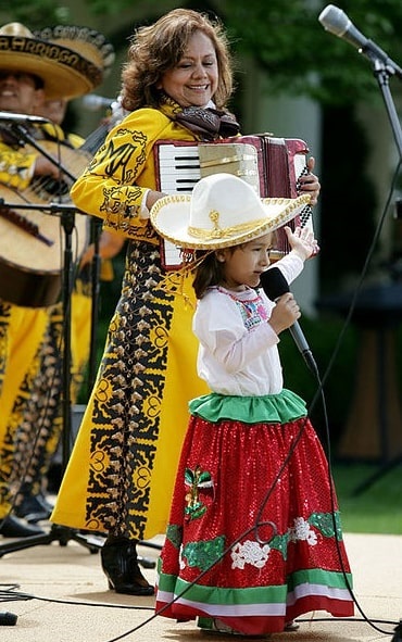 Photo: performers at the White House celebration of Cinco de Mayo in 2007. Credit: Wikimedia Commons.