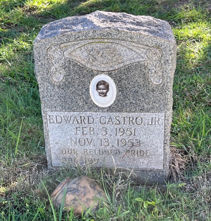 Photo: porcelain portrait of Edward Castro Jr. on his gravestone in Holy Ghost Church Catholic Cemetery, Kula, Maui, Hawaii. Credit: Gena Philibert-Ortega.