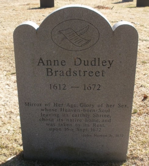 Photo: memorial marker for Anne Dudley Bradstreet in the Old North Parish Burial Ground, North Andover, Massachusetts. Credit: Sarnold17; Wikimedia Commons.