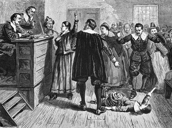 Illustration: witchcraft trial at Salem Village. The central figure in this 1876 illustration of the courtroom is usually identified as Mary Walcott. Credit: Wikimedia Commons.