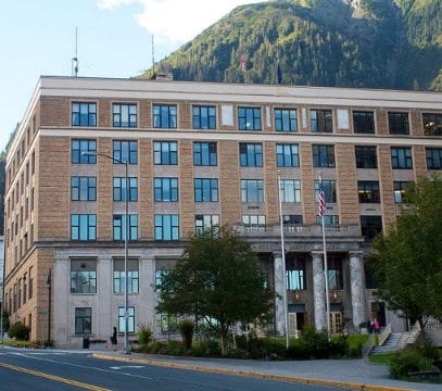 Photo: Alaska State Capitol Building, Juneau, Alaska. Credit: Jay Galvin; Wikimedia Commons.