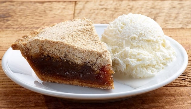 Photo: slice of shoofly pie with ice cream. Credit: Good N Plenty; Wikimedia Commons.