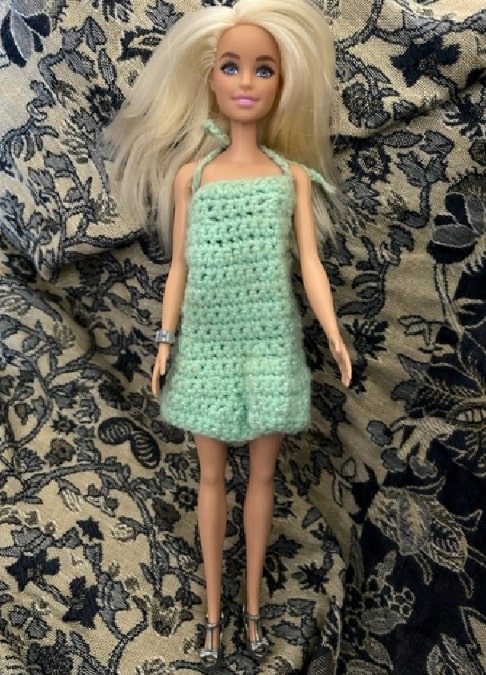 Photo: Barbie in crocheted dress made by the author’s mother and grandmother. Credit: Gena Philibert-Ortega.