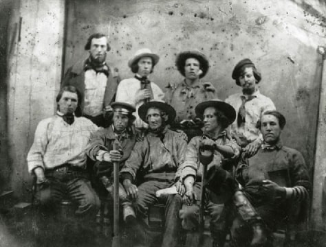 Photo: a group of miners. Courtesy of the California Historical Society.