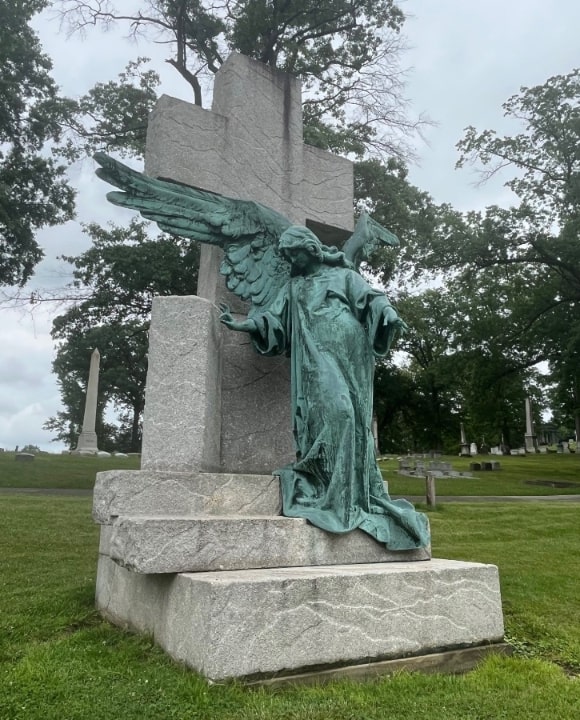 Photo: Alleghany Cemetery, angel and cross. Credit: Gena Philibert-Ortega.